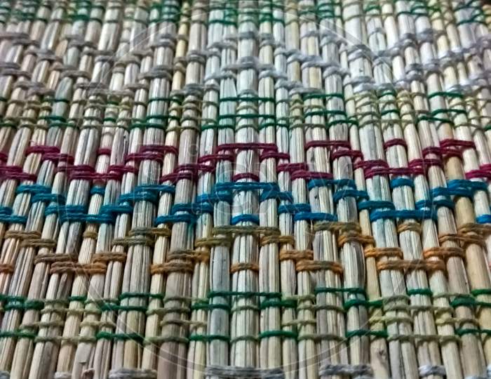 Table Mat made of Calamus Tenius and colorful Threads