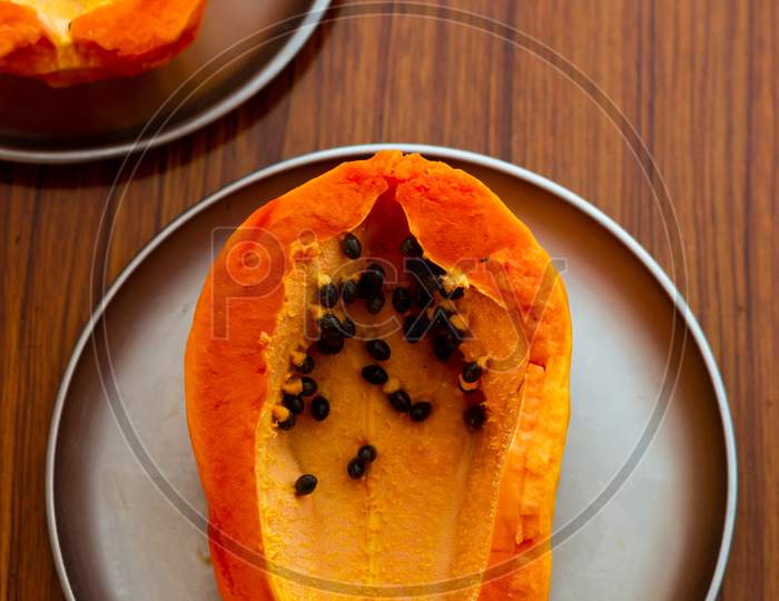 Papaya In A Plate On The Table