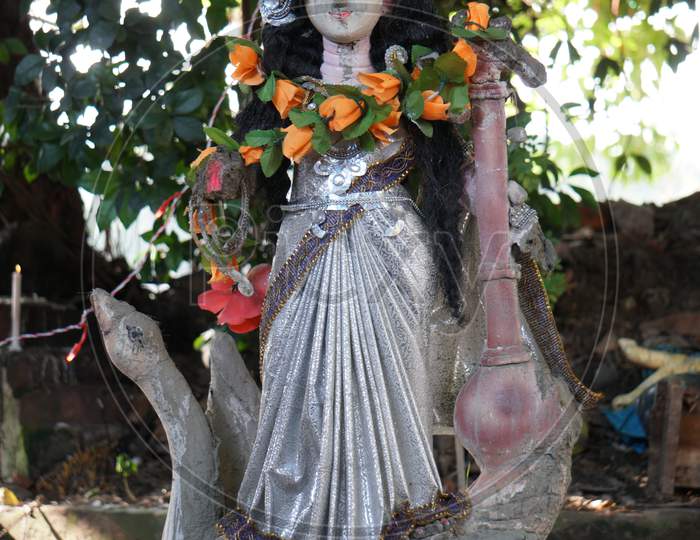 The Idol Of The Hindu Goddess Saraswati Davi. A Sculpture Made By The Artist.