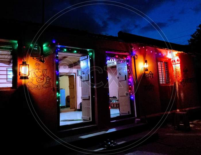 Indian village house lighten up for Diwali festival with antique lintern