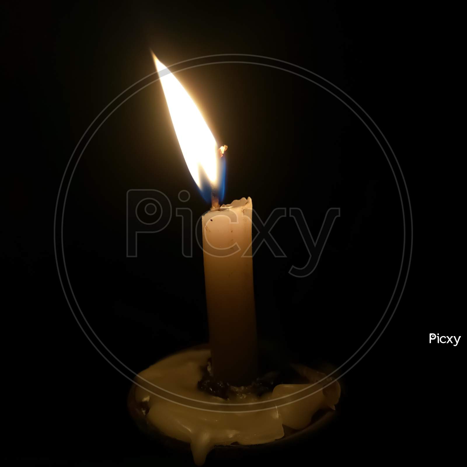 A Burning Candle in the Dark