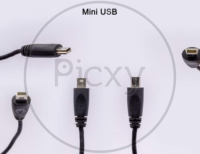 Mini Usb Cable From Different Angles Isolated Against White Background.