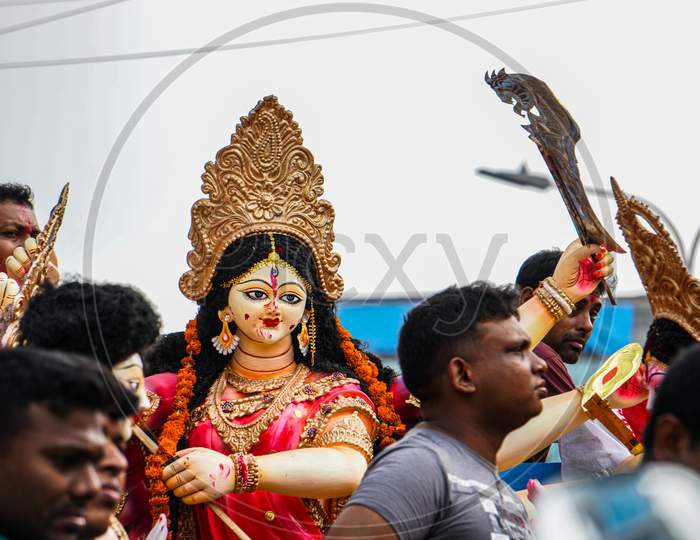 Image Of The Great Fort Festival Of Hinduism. Image Of Goddess Durga. It Is A Sculpture Made By The Artist. The Goddess Is Taken Away For Abandonment.