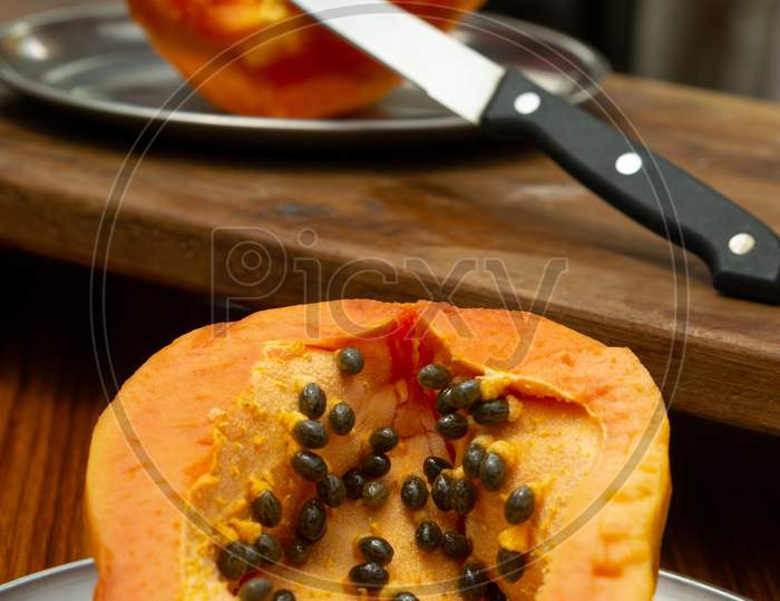 Papaya In A Plate On The Table