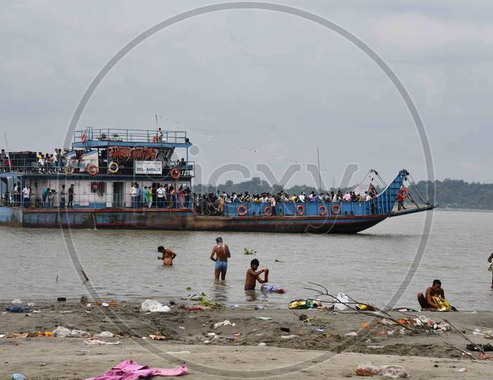People cross the river Brahmaputra by ferryboat in Guwahati On Oct 22,2020.
