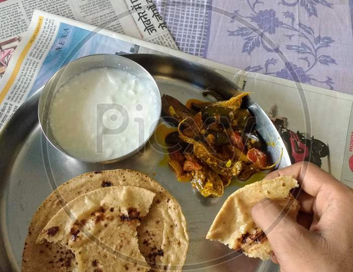 Common man food chapati roti dahi vegetables