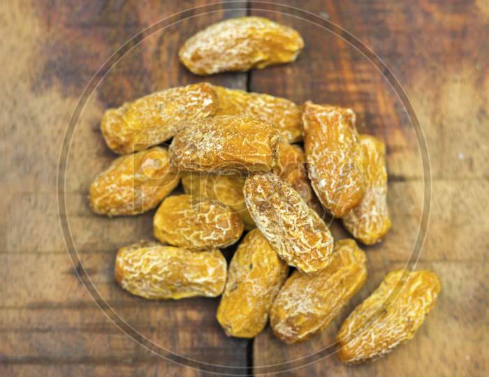 selective focus of dried dates fruits.