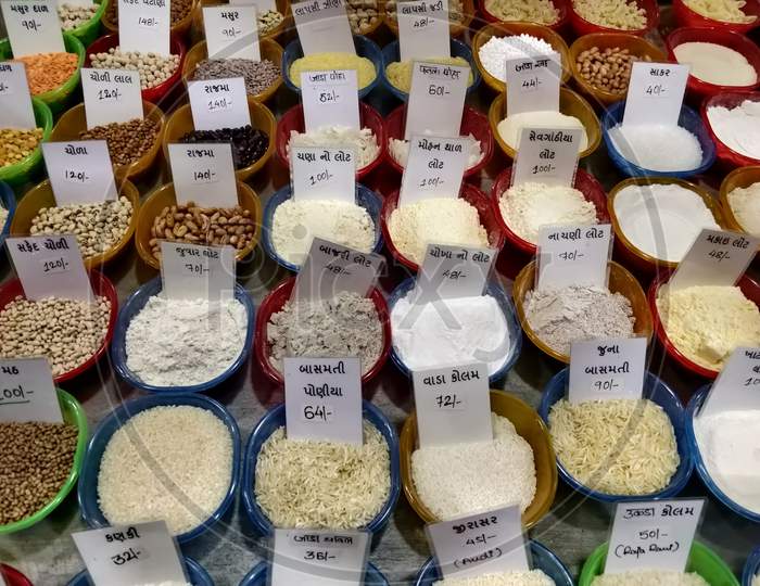 Various grains and flour for sale at a market in Mumbai