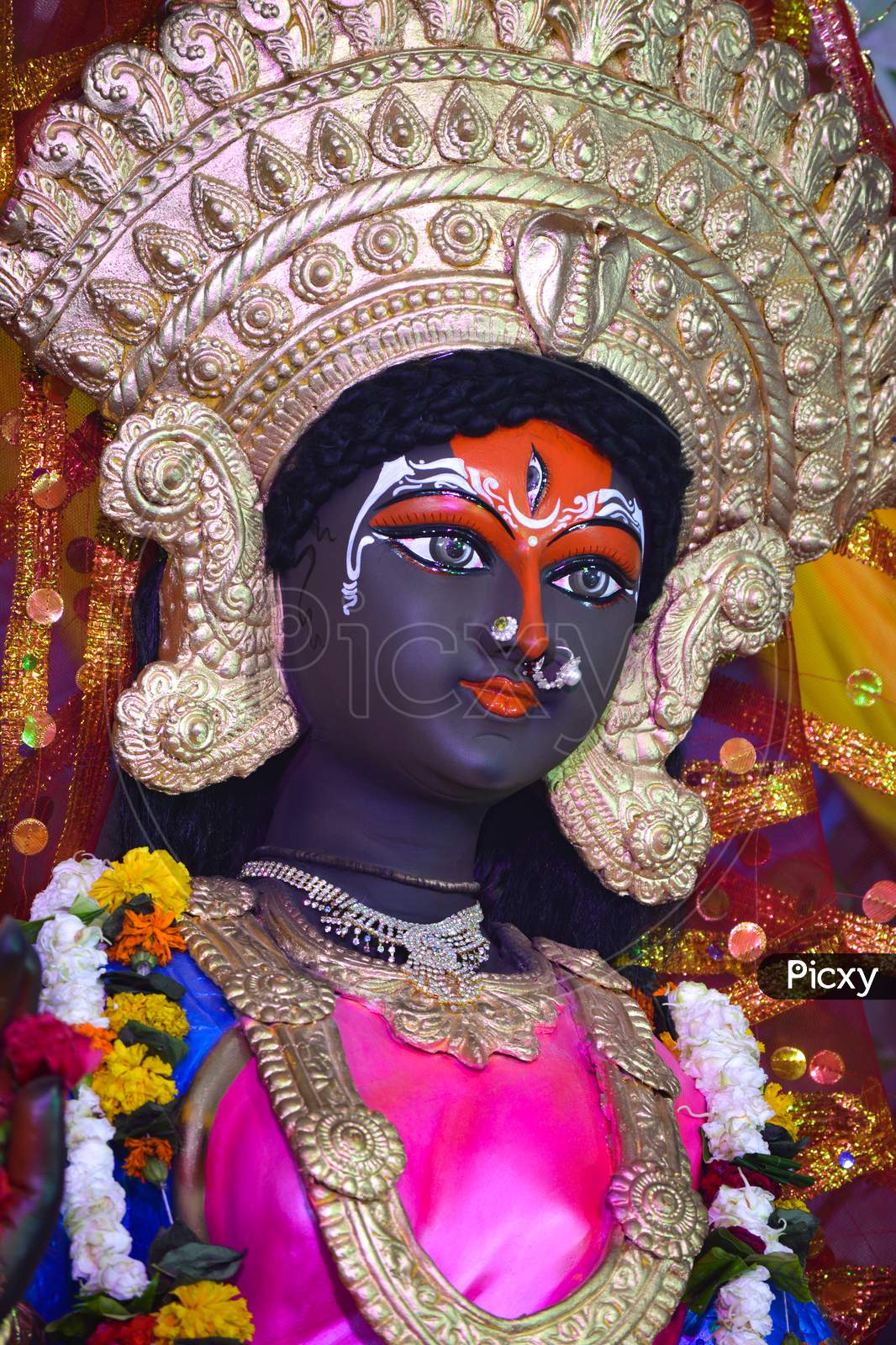 Closeup of face of Goddess Durga, Idol of goddess Durga, hindu festival navratri.