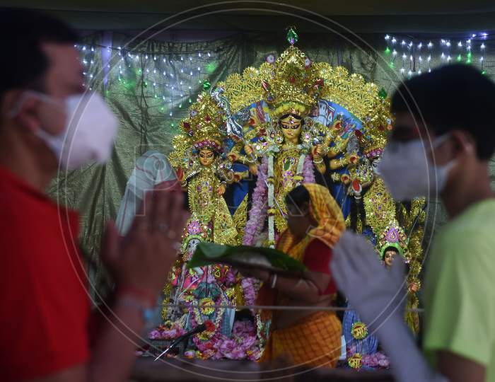Devotees Offer Prayers At A Community Pandal During The Ongoing Durga Puja Festival, In Chennai. Friday,Oct. 23, 2020.