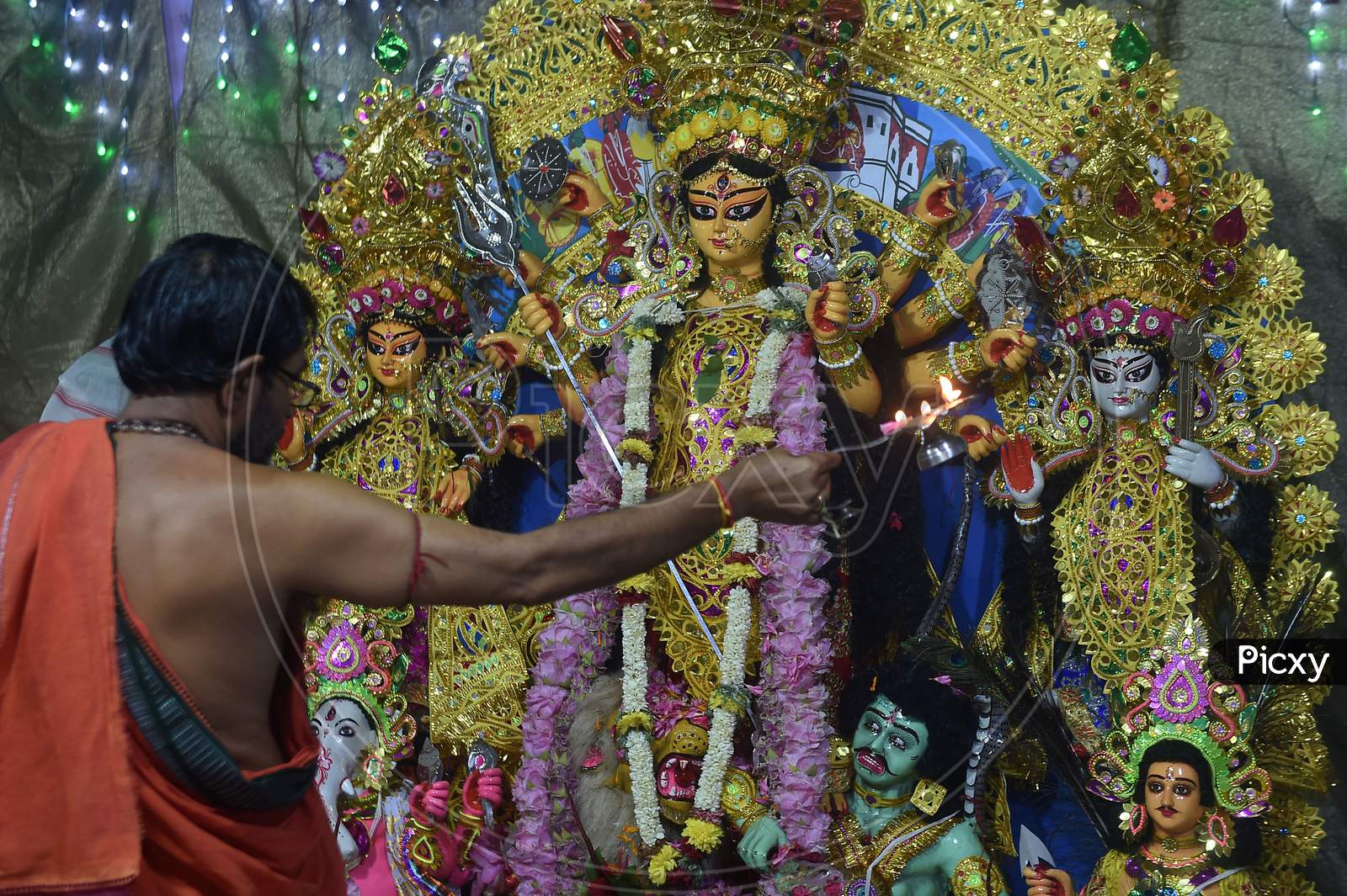 Priest Performs Rituals At A Community Pandal During The Ongoing Durga Puja Festival, In Chennai. Friday,Oct. 23, 2020.