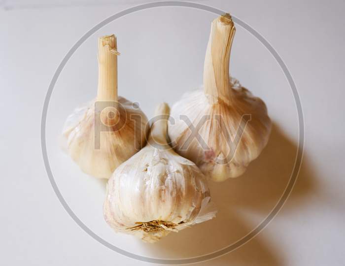 Top Shot Of Garlic Isolated On White Background