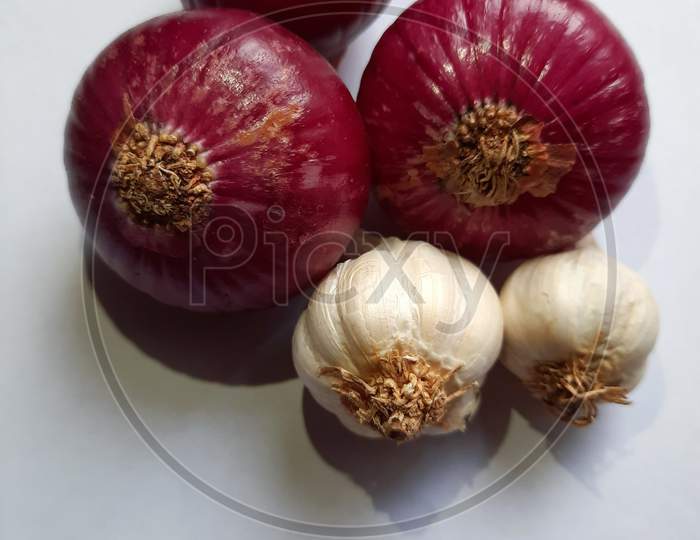 Indian Red Onions and garlic, in inda Onions and garlic Prices Hike, price rises
