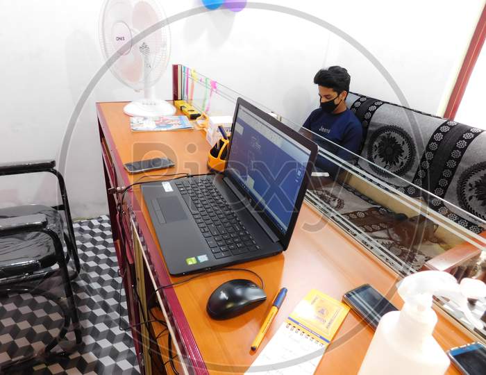 Closeup Of An Engineer Office With People And Equipments