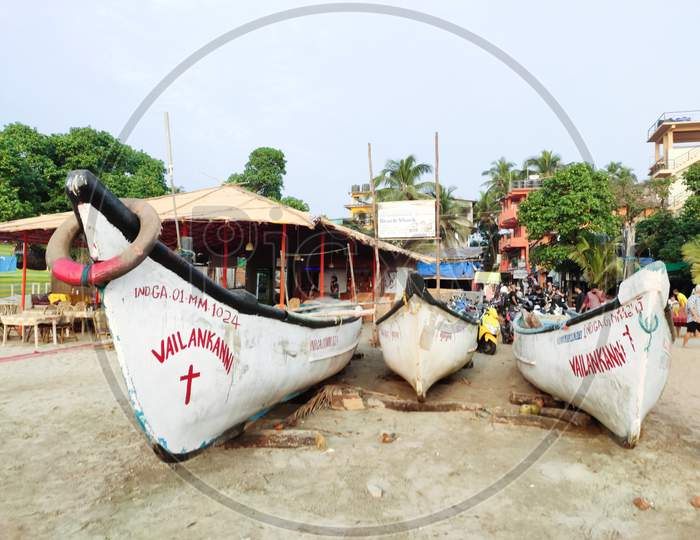 Goa - india - December 2019: boats parked along the shores of arambol beach in north goa