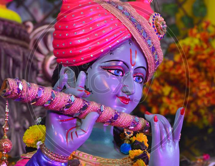 Hindu God Krishna with flute