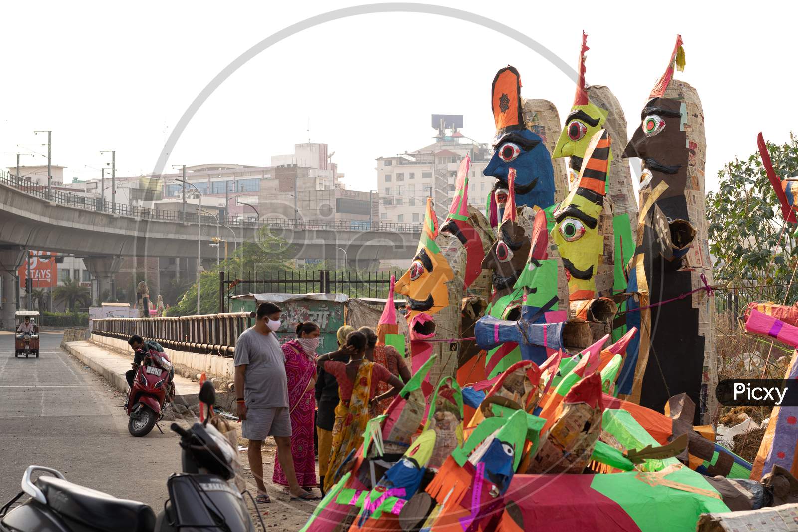 People buying Ravana effigies for Ravan Dahan before Dussehra at Ravan Mandi, Jaipur, Oct 23, 2020