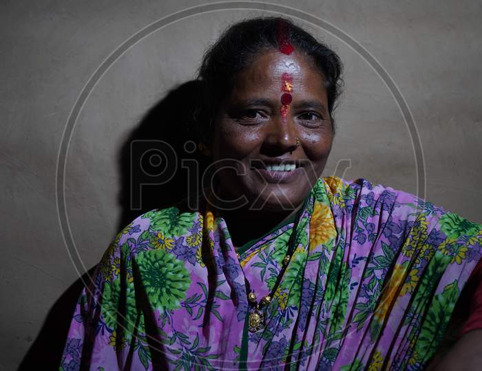 Almora, India - September 06, 2020: Low Key Portrait Of A Village Woman, Wearing Traditional Clothes.