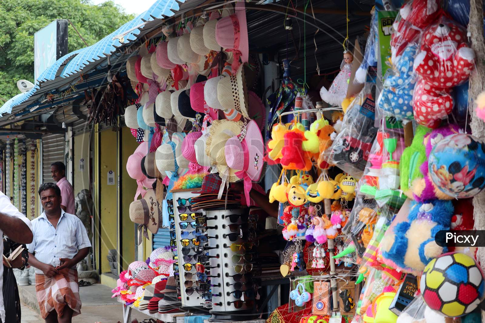 Cap Shop Opened On The Footpath In The Market To Trade The Upcoming Festivals