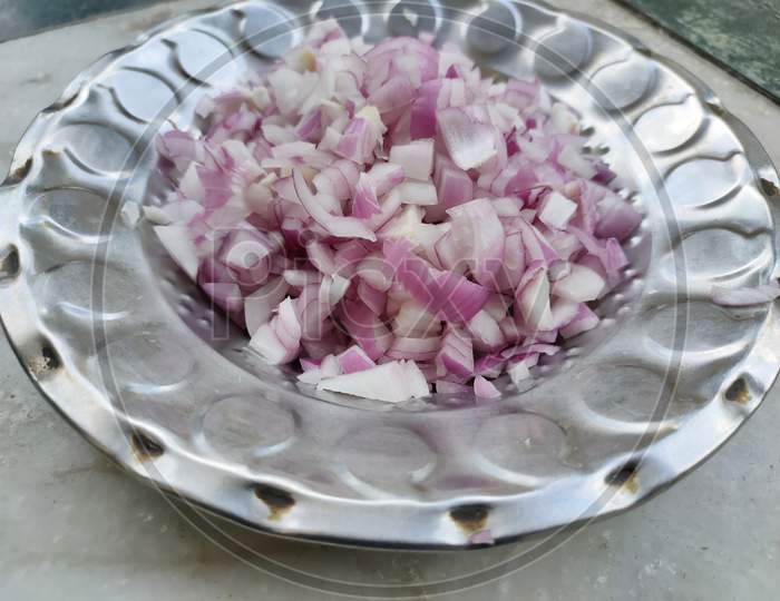 Chopped onion pieces in plate