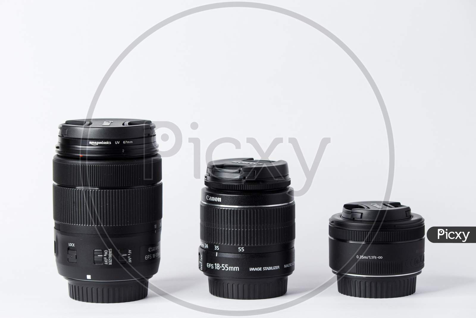 A set of three camera lenses