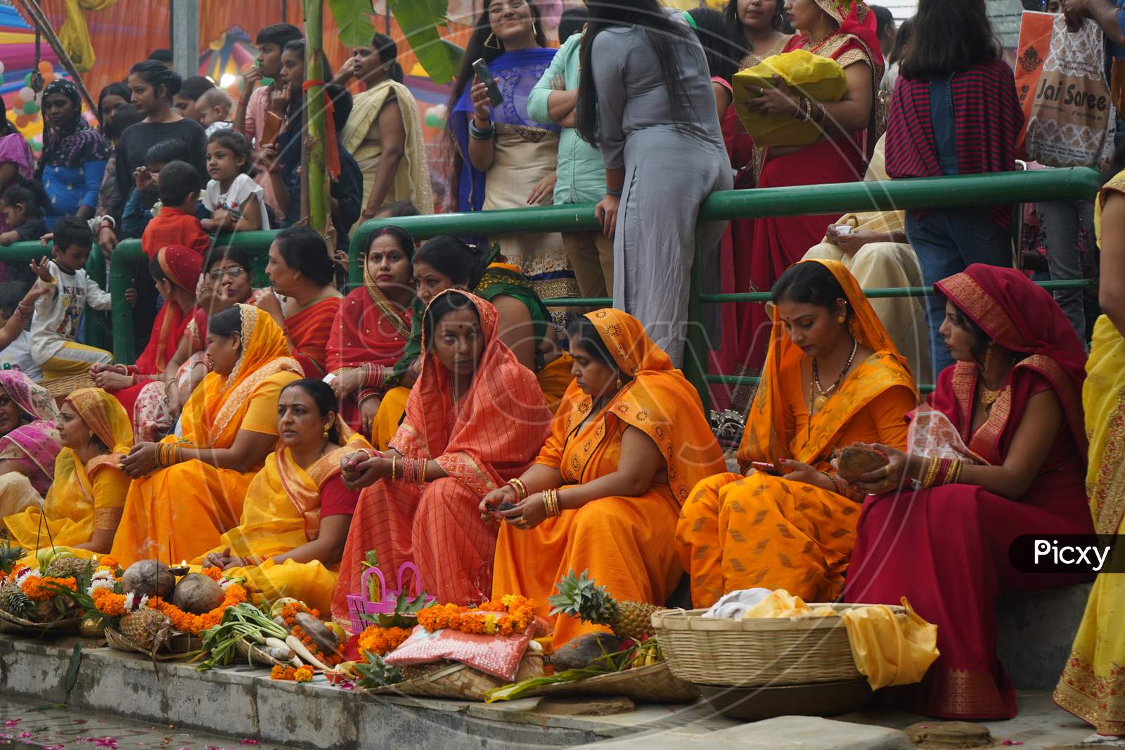 New Delhi, Delhi/ India- October 24 2020 : Women Of India Celebrating Chhath Pooja By Drowning Themselves In Water For Praying To Sun.
