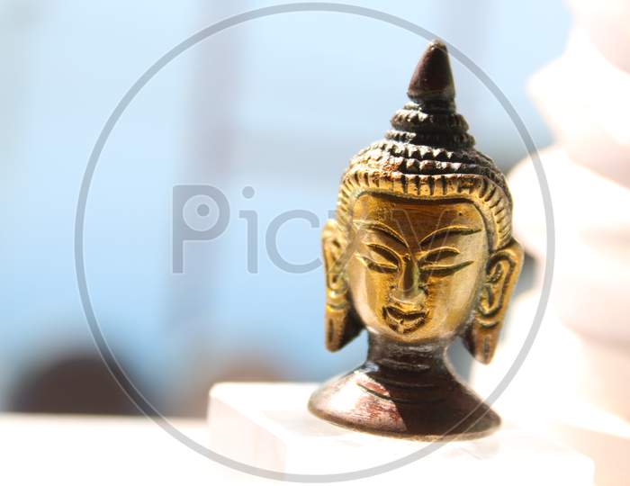 Lord Goutam Buddha gold  face  statue