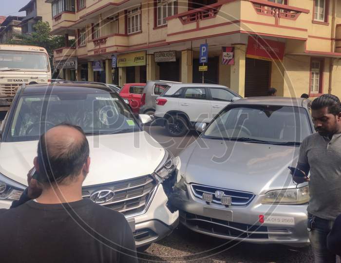 Goa - india - December 2019:  People watching the two cars crashed in accident