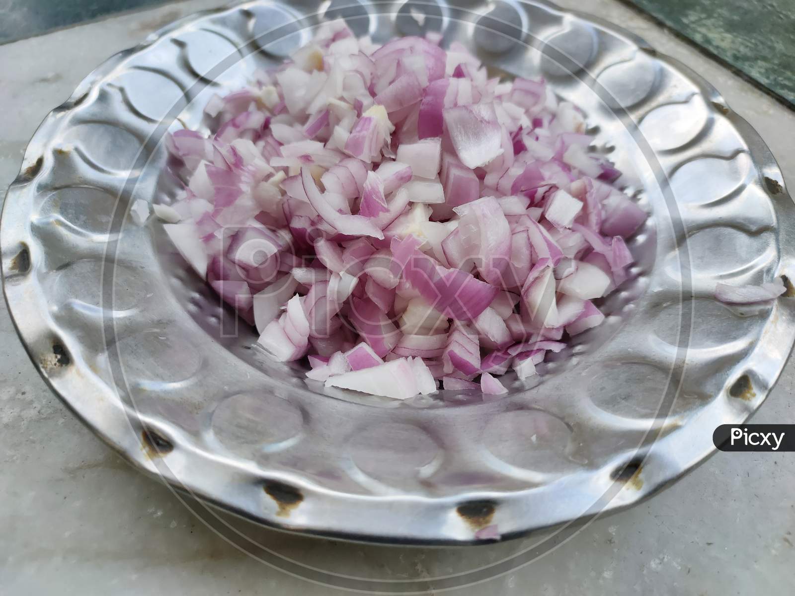 Chopped onion pieces in plate
