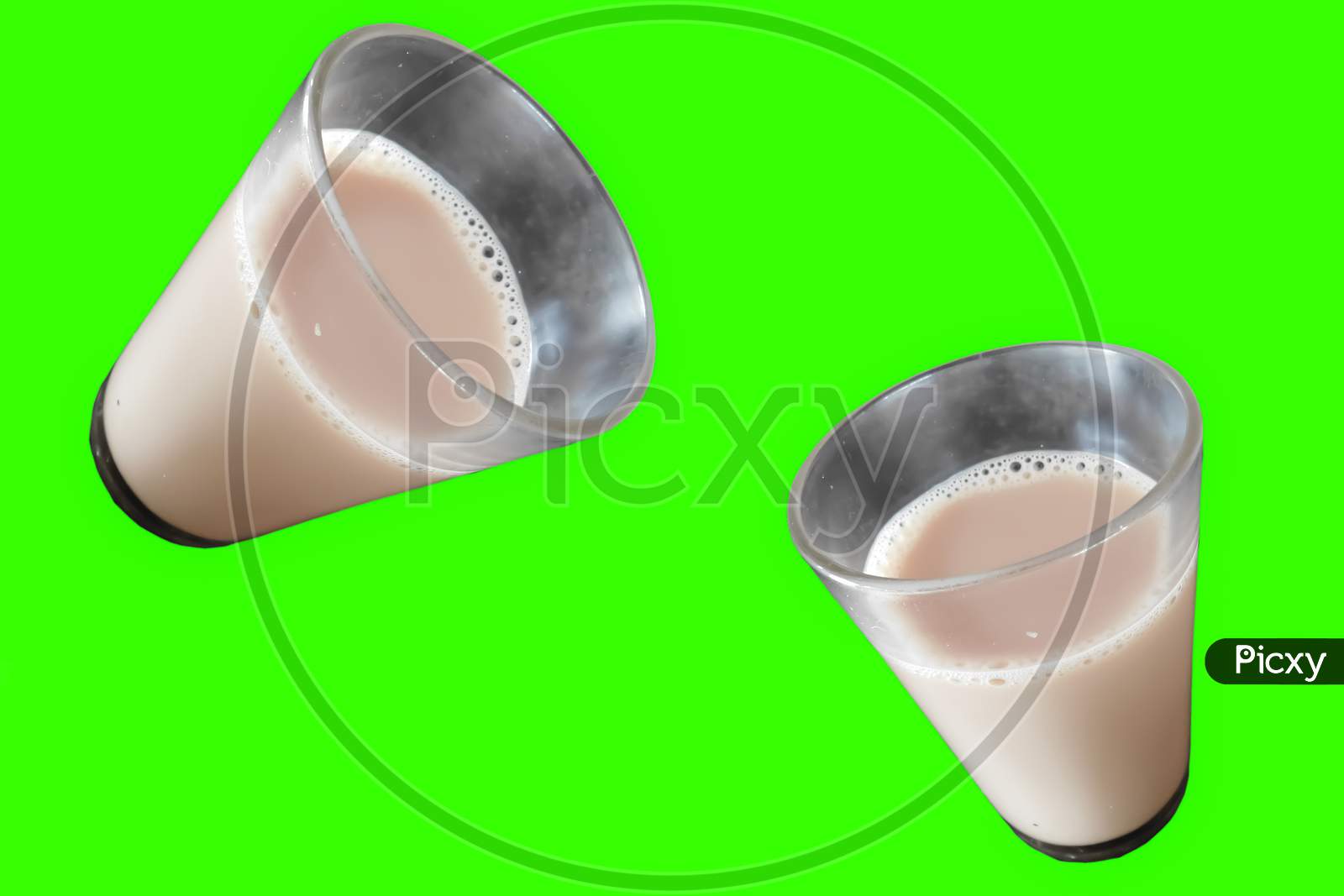 Closeup View Of Drinking Glasses With Tea Green Background