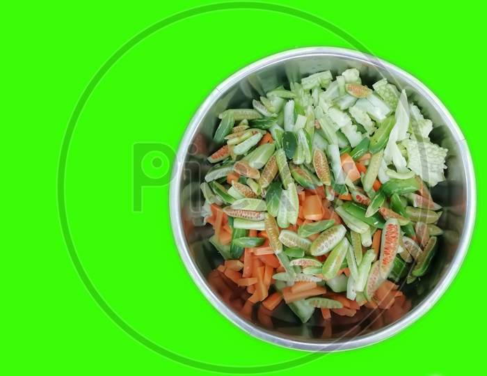 Delicious Vegetable Salad Food In A Bowl Isolated On Green Background
