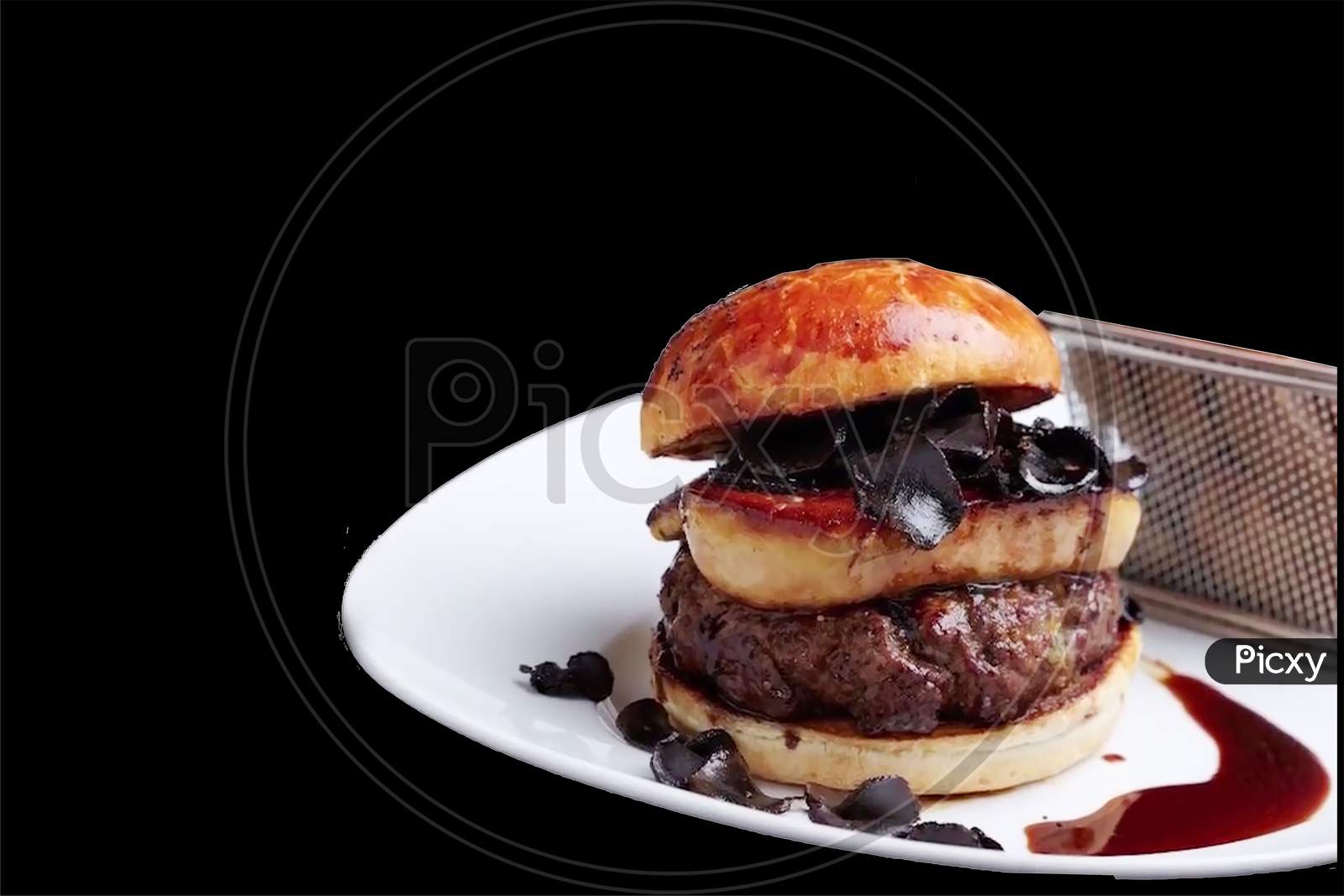 beef meat expensive burger with cheese and green salad on a black background
