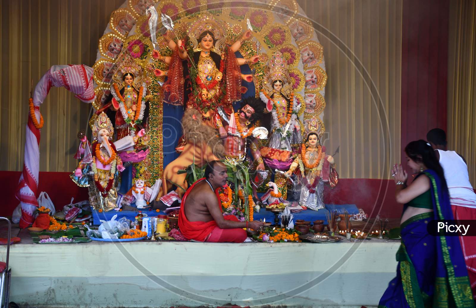 Devotees offer prayers at a community pandal during the Maha  navami  of Durga Puja, in Guwahati on Oct 25,2020