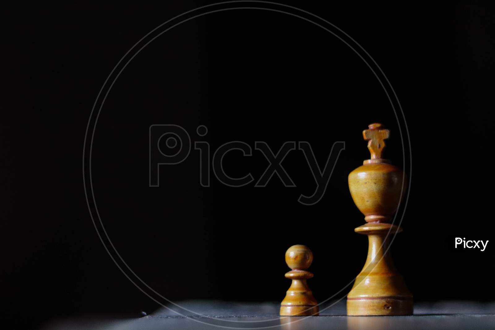 King & pawn on a chess board