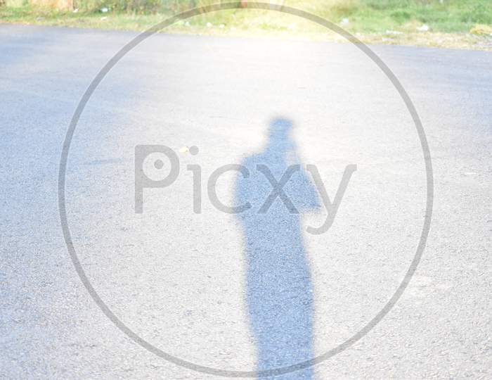 A shadow of photographer
