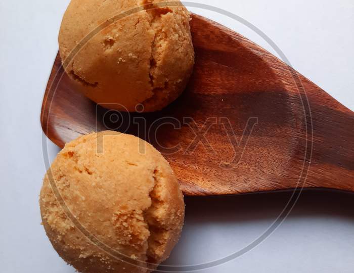 shortbread biscuits, originating from the Indian subcontinent, popular in Northern India Closeup with wooden spoon