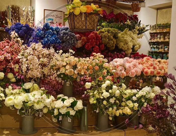 Multi-Colored Artificial Flowers For Display