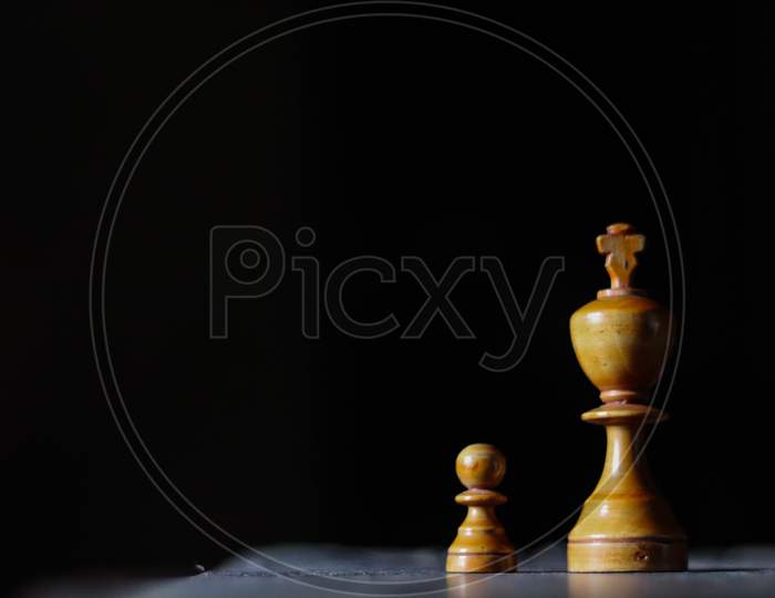 King & pawn on a chess board