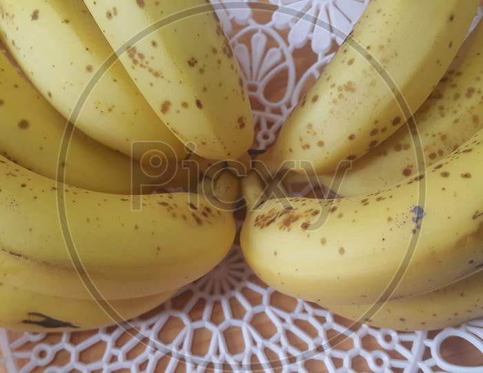 Close Up View Of Cultivated Ripe Banana Placed In Plastic Changair