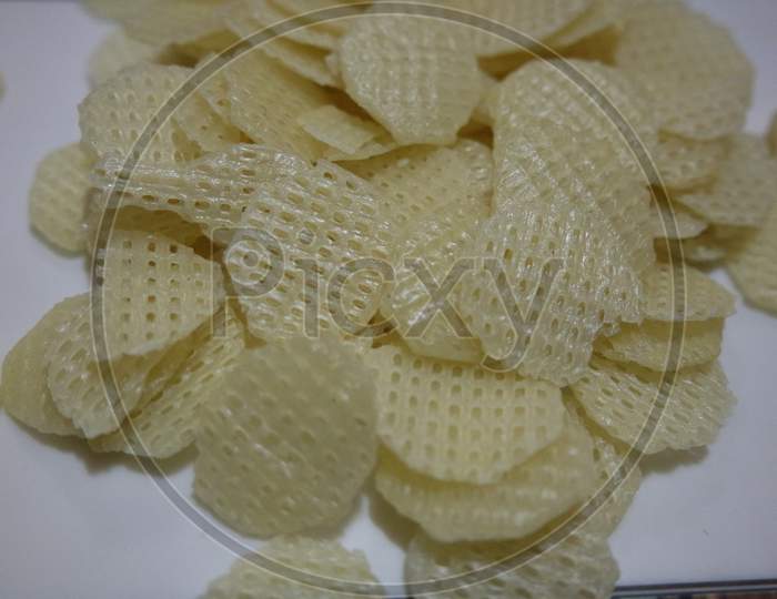Closeup View Of Dried Chips As Fast Food Usually Eaten With Tea.