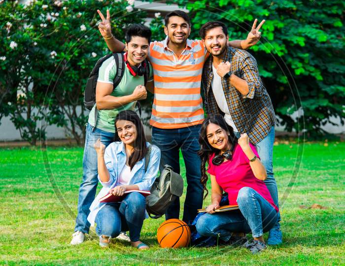 Education Is Fun - Cheerful Indian Asian Young Students Enjoying Togetherness In College Campus