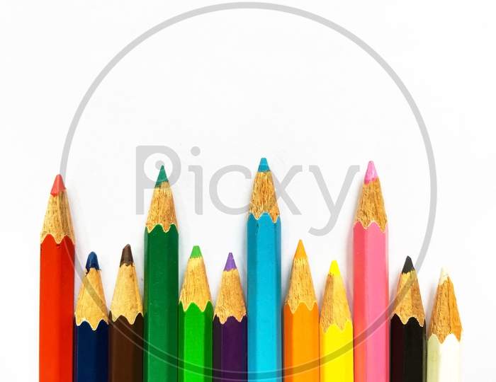 Colourful wood pencils on white background