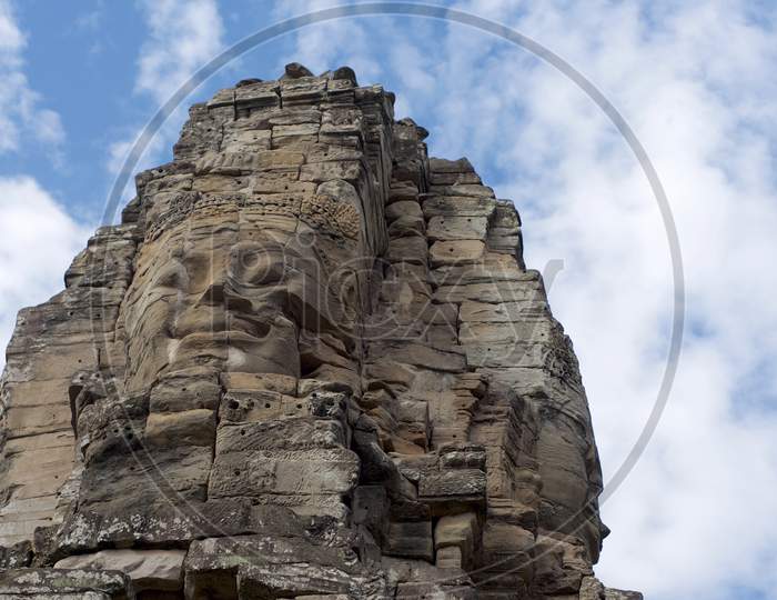 Low Angle View Of Traditional Stone Faces At Bayon Temple