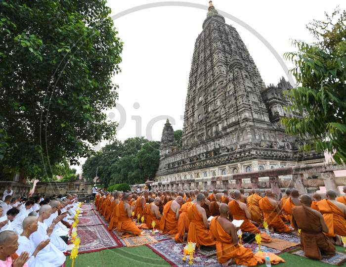 Buddhist Monks And Devotees