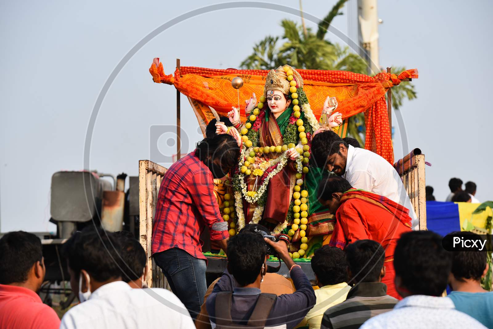 Devotees bring Idols of Goddess Durga for immersion in Hussain Sagar on the last day of Durga Puja/Dasara/Navratri in Hyderabad on October 26, 2020.