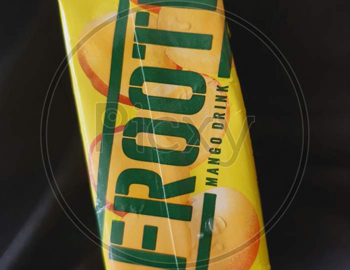 close up view of Frooti Drink in black background . It is a drink from Parle Agro India Pvt Ltd