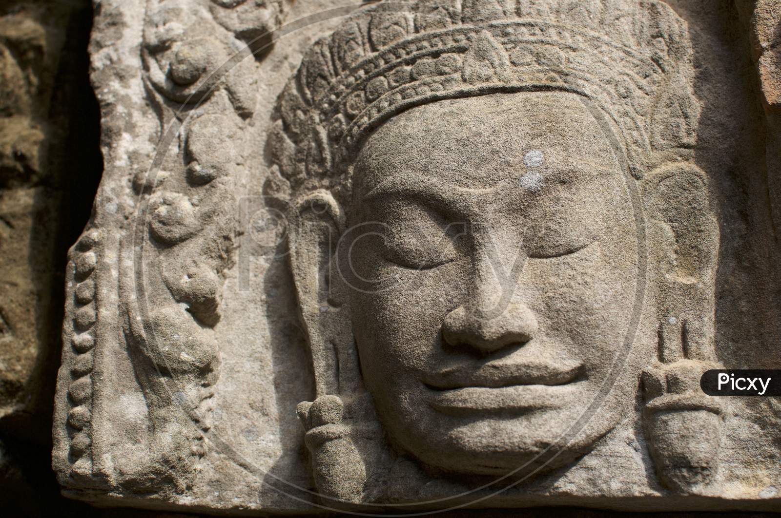 Stone Buddha Statue At Angkor Wat In Cambodia