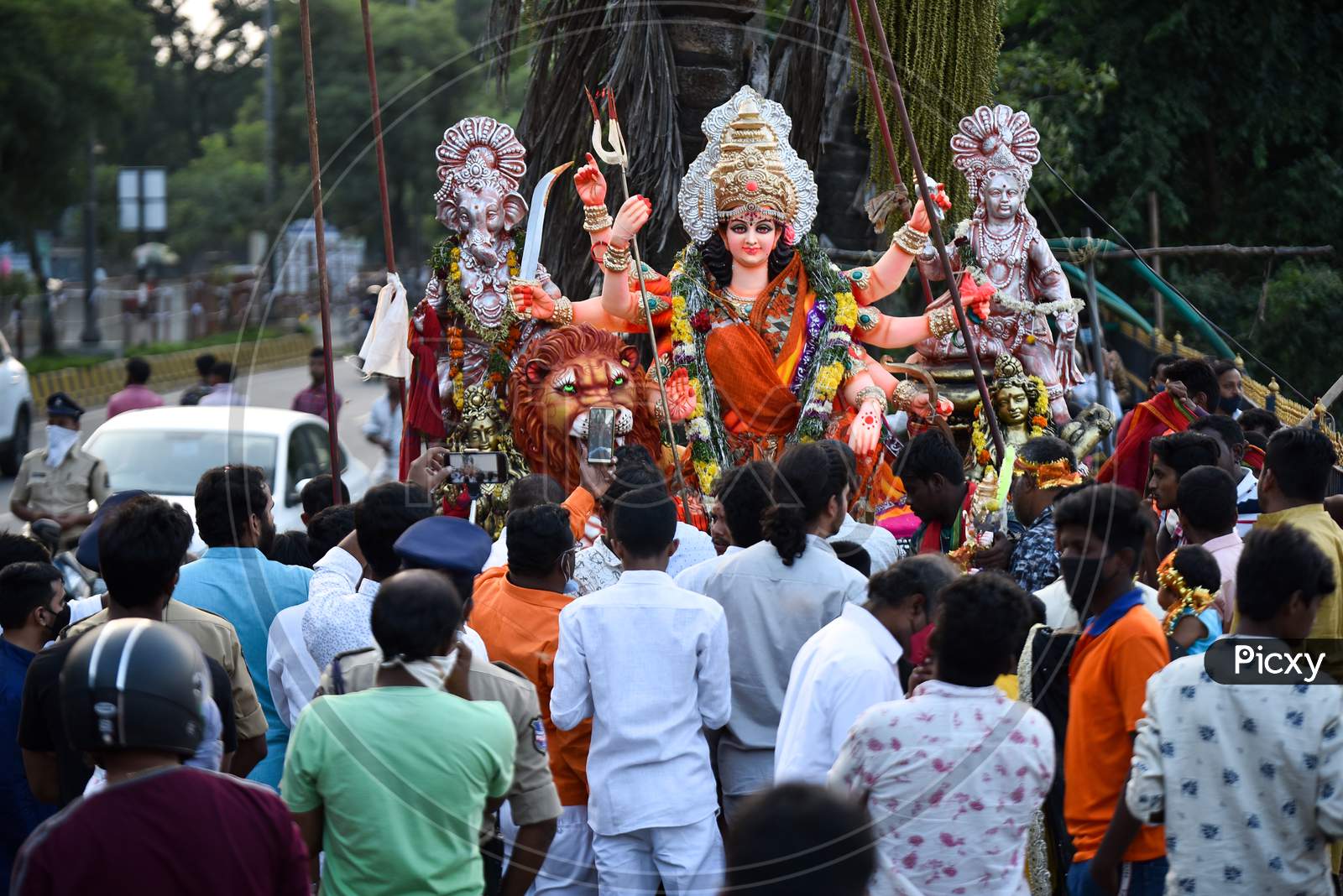 Devotees bring Idols of Goddess Durga for immersion in Hussain Sagar on the last day of Durga Puja/Dasara/Navratri in Hyderabad on October 26, 2020.