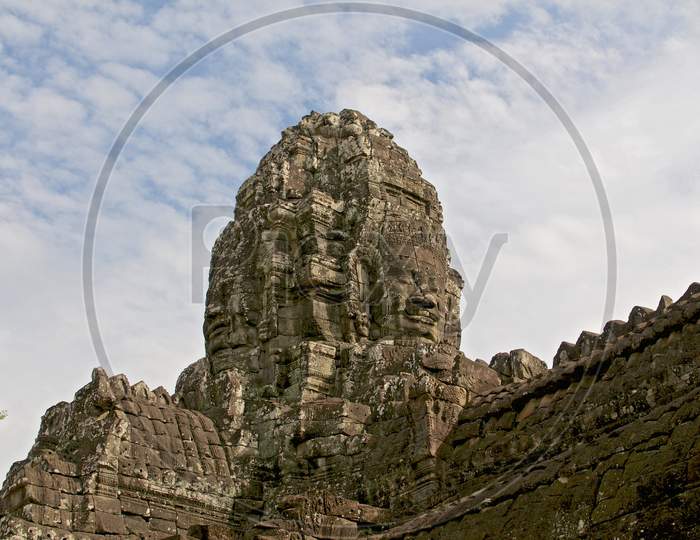 View Of Traditional Stone Faces Tower At Bayon Temple