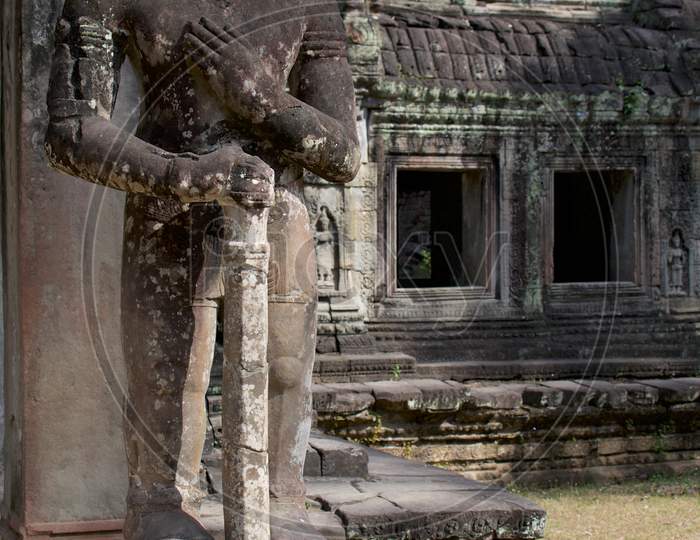 Headless Warrior Statue At Preah Khan Temple In Angkor Wat, Cambodia